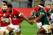 24 July 2021; Courtney Lawes of British and Irish Lions is tackled by Siya Kolisi of South Africa during the first test of the British and Irish Lions tour match between South Africa and British and Irish Lions at Cape Town Stadium in Cape Town, South Africa. Photo by Ashley Vlotman/Sportsfile