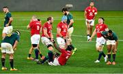 24 July 2021; Maro Itoje, 4, is helped to his feet by team-mates Alun Wyn Jones, left, and Tadhg Beirne of British and Irish Lions after their win during the first test of the British and Irish Lions tour match between South Africa and British and Irish Lions at Cape Town Stadium in Cape Town, South Africa. Photo by Ashley Vlotman/Sportsfile