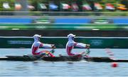 25 July 2021; Mutiara Putri, left, and Melani Putri of Indonesia compete in the Women's Pair repechage at the Sea Forest Waterway during the 2020 Tokyo Summer Olympic Games in Tokyo, Japan. Photo by Seb Daly/Sportsfile