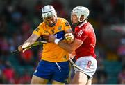 23 July 2021; Conor Cleary of Clare is tackled by Patrick Horgan of Cork during the GAA Hurling All-Ireland Senior Championship Round 2 match between Clare and Cork at LIT Gaelic Grounds in Limerick. Photo by Eóin Noonan/Sportsfile