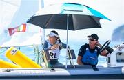 25 July 2021; Annalise Murphy of Ireland with her coach Rory Fitzpatrick in between races at the Women's Laser Radial races at the Enoshima Yacht Harbour during the 2020 Tokyo Summer Olympic Games in Tokyo, Japan. Photo by Stephen McCarthy/Sportsfile