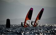 25 July 2021; Ingrid Puusta of Estonia, left, and Nikola Girke of Canada in action during the Women's Windsurfer races at the Enoshima Yacht Harbour during the 2020 Tokyo Summer Olympic Games in Tokyo, Japan. Photo by Stephen McCarthy/Sportsfile