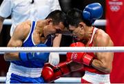 25 July 2021; Zakir Safiullin of Kazakhstan, blue, and Leodan Pezo Saboya of Peru during their Men's Lightweight Round of 32 bout at the Kokugikan Arena during the 2020 Tokyo Summer Olympic Games in Tokyo, Japan. Photo by Ramsey Cardy/Sportsfile