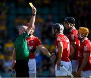 23 July 2021; Referee John Keenan shows a second yellow card to Niall O'Leary, right, before showing him a red card, during the GAA Hurling All-Ireland Senior Championship Round 2 match between Clare and Cork at LIT Gaelic Grounds in Limerick. Photo by Piaras Ó Mídheach/Sportsfile