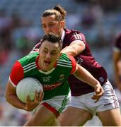 25 July 2021; Diarmuid O'Connor of Mayo in action against Kieran Molly of Galway during the Connacht GAA Senior Football Championship Final match between Galway and Mayo at Croke Park in Dublin. Photo by Ray McManus/Sportsfile