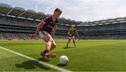 25 July 2021; Johnny Heaney of Galway keeps the ball in play under pressure from Bryan Walsh of Mayo during the Connacht GAA Senior Football Championship Final match between Galway and Mayo at Croke Park in Dublin. Photo by Ray McManus/Sportsfile