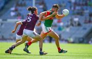 25 July 2021; Aidan O'Shea of Mayo is tackled by Kieran Molloy of Galway during the Connacht GAA Senior Football Championship Final match between Galway and Mayo at Croke Park in Dublin. Photo by Ray McManus/Sportsfile