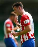 25 July 2021; Joel Coustrain of Treaty United cools down with water during the FAI Cup First Round match between Treaty United and Dundalk at Market's Field in Limerick. Photo by Diarmuid Greene/Sportsfile