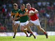 25 July 2021; Damien Gore of Cork in action against Brian Ó Beaglaoic of Kerry during the Munster GAA Football Senior Championship Final match between Kerry and Cork at Fitzgerald Stadium in Killarney, Kerry. Photo by Eóin Noonan/Sportsfile