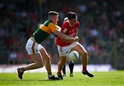 25 July 2021; Daniel Dineen of Cork is tackled by Jason Foley of Kerry during the Munster GAA Football Senior Championship Final match between Kerry and Cork at Fitzgerald Stadium in Killarney, Kerry. Photo by Eóin Noonan/Sportsfile