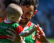25 July 2021; Kevin McLoughlin of Mayo and his nine month old daughter Saorla are congratulated after the Connacht GAA Senior Football Championship Final match between Galway and Mayo at Croke Park in Dublin. Photo by Ray McManus/Sportsfile