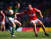 25 July 2021; David Moran of Kerry is tackled by Daniel Dineen of Cork during the Munster GAA Football Senior Championship Final match between Kerry and Cork at Fitzgerald Stadium in Killarney, Kerry. Photo by Piaras Ó Mídheach/Sportsfile