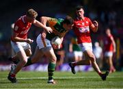 25 July 2021; David Moran of Kerry is tackled by Ruairi Deane of Cork during the Munster GAA Football Senior Championship Final match between Kerry and Cork at Fitzgerald Stadium in Killarney, Kerry. Photo by Piaras Ó Mídheach/Sportsfile