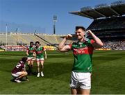 25 July 2021; Matthew Ruane of Mayo celebrates as Paddy Durcan and Stephen Coen of Mayo commiserate with Cathal Sweeney of Galway after the Connacht GAA Senior Football Championship Final match between Galway and Mayo at Croke Park in Dublin. Photo by Ray McManus/Sportsfile