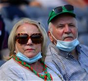 25 July 2021; Two Mayo supporters watch the final minutes of the Connacht GAA Senior Football Championship Final match between Galway and Mayo at Croke Park in Dublin. Photo by Ray McManus/Sportsfile