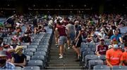 25 July 2021; A few Galway supporters leave the Hogan Stand before the end of the Connacht GAA Senior Football Championship Final match between Galway and Mayo at Croke Park in Dublin. Photo by Ray McManus/Sportsfile