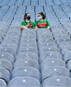 25 July 2021; Sisters Leah, left, and Cara Fahey, from Swinford, relax in the Cusack stand before the Connacht GAA Senior Football Championship Final match between Galway and Mayo at Croke Park in Dublin. Photo by Ray McManus/Sportsfile