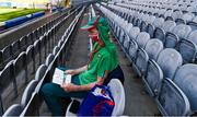 25 July 2021; Mayo supporter Seosamh Ó Maolchroim, from AghaGower, reaads his match programme before the Connacht GAA Senior Football Championship Final match between Galway and Mayo at Croke Park in Dublin. Photo by Ray McManus/Sportsfile