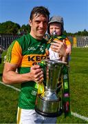 25 July 2021; Kerry footballer David Moran and his son Eli celebrate with the cup after the Munster GAA Football Senior Championship Final match between Kerry and Cork at Fitzgerald Stadium in Killarney, Kerry. Photo by Piaras Ó Mídheach/Sportsfile