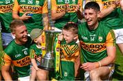 25 July 2021; Kerry footballer Paul Geaney and his son Paidi celebrate with the cup after the Munster GAA Football Senior Championship Final match between Kerry and Cork at Fitzgerald Stadium in Killarney, Kerry. Photo by Piaras Ó Mídheach/Sportsfile