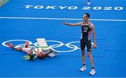26 July 2021; Kristian Blummenfelt of Norway, 1st place, left, and Alex Yee of Great Britain, 2nd place, celebrate at the finish line of the men's triathlon at the Odaiba Marine Park during the 2020 Tokyo Summer Olympic Games in Tokyo, Japan. Photo by Ramsey Cardy/Sportsfile