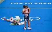 26 July 2021; Kristian Blummenfelt of Norway, 1st place, Alex Yee of Great Britain, 2nd place, and Hayden Wilde of New Zealand, 3rd place, celebrate at the finish line of the men's triathlon at the Odaiba Marine Park during the 2020 Tokyo Summer Olympic Games in Tokyo, Japan. Photo by Ramsey Cardy/Sportsfile