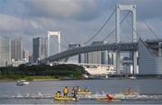 26 July 2021; Triathletes pass Rainbow Bridge in Tokyo Bay during the swimming discipline of the men's triathlon at the Odaiba Marine Park during the 2020 Tokyo Summer Olympic Games in Tokyo, Japan. Photo by Ramsey Cardy/Sportsfile