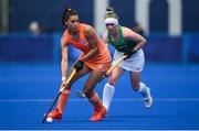 26 July 2021; Malou Pheninckz of Netherlands in action against Naomi Carroll of Ireland during the women's pool A group stage match between Ireland and Netherlands at the Oi Hockey Stadium during the 2020 Tokyo Summer Olympic Games in Tokyo, Japan. Photo by Stephen McCarthy/Sportsfile
