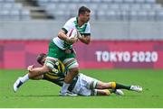 26 July 2021; Harry McNulty of Ireland is tackled by Impi Visser of South Africa during the rugby sevens men's pool C match between Ireland and South Africa at the Tokyo Stadium during the 2020 Tokyo Summer Olympic Games in Tokyo, Japan. Photo by Brendan Moran/Sportsfile