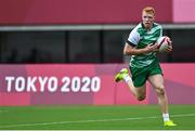26 July 2021; Gavin Mullin of Ireland on his way to scoring his side's first try during the rugby sevens men's pool C match between Ireland and South Africa at the Tokyo Stadium during the 2020 Tokyo Summer Olympic Games in Tokyo, Japan. Photo by Brendan Moran/Sportsfile