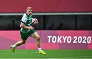 26 July 2021; Gavin Mullin of Ireland on his way to scoring his side's first try during the rugby sevens men's pool C match between Ireland and South Africa at the Tokyo Stadium during the 2020 Tokyo Summer Olympic Games in Tokyo, Japan. Photo by Brendan Moran/Sportsfile
