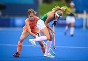 26 July 2021; Chloe Watkins of Ireland in action against Marloes Johanna Maria Keetels of Netherlands during the women's pool A group stage match between Ireland and Netherlands at the Oi Hockey Stadium during the 2020 Tokyo Summer Olympic Games in Tokyo, Japan. Photo by Stephen McCarthy/Sportsfile
