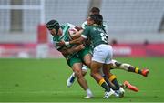 26 July 2021; Foster Horan of Ireland is tackled by Siviwe Soyizwapi, left, and Selvyn Davids of South Africa during the rugby sevens men's pool C match between Ireland and South Africa at the Tokyo Stadium during the 2020 Tokyo Summer Olympic Games in Tokyo, Japan. Photo by Brendan Moran/Sportsfile