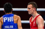 26 July 2021; Brendan Irvine of Ireland following defeat to Carlo Paalam of Philippines in their Men's Flyweight Round of 32 bout at the Kokugikan Arena during the 2020 Tokyo Summer Olympic Games in Tokyo, Japan. Photo by Ramsey Cardy/Sportsfile