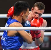 26 July 2021; Brendan Irvine of Ireland, red, and Carlo Paalam of Philippines during their Men's Flyweight Round of 32 bout at the Kokugikan Arena during the 2020 Tokyo Summer Olympic Games in Tokyo, Japan. Photo by Ramsey Cardy/Sportsfile