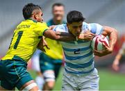 26 July 2021; Lucio Cinti of Argentina is tackled by Maurice Longbottom of Australia during the rugby sevens men's pool A match between Australia and Argentina at the Tokyo Stadium during the 2020 Tokyo Summer Olympic Games in Tokyo, Japan. Photo by Brendan Moran/Sportsfile