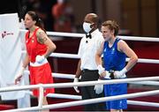 26 July 2021; Michaela Walsh of Ireland, right, and Irma Testa of Italy after their Women's Featherweight Round of 16 bout at the Kokugikan Arena during the 2020 Tokyo Summer Olympic Games in Tokyo, Japan. Photo by Ramsey Cardy/Sportsfile