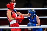 26 July 2021; Michaela Walsh of Ireland, right, and Irma Testa of Italy during their Women's Featherweight Round of 16 bout at the Kokugikan Arena during the 2020 Tokyo Summer Olympic Games in Tokyo, Japan. Photo by Ramsey Cardy/Sportsfile