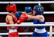 26 July 2021; Michaela Walsh of Ireland, right, and Irma Testa of Italy during their Women's Featherweight Round of 16 bout at the Kokugikan Arena during the 2020 Tokyo Summer Olympic Games in Tokyo, Japan. Photo by Ramsey Cardy/Sportsfile