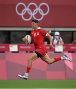 26 July 2021; Justin Douglas of Canada on his way to scoring a try during the rugby sevens men's pool B match between Fiji and Canada at the Tokyo Stadium during the 2020 Tokyo Summer Olympic Games in Tokyo, Japan. Photo by Stephen McCarthy/Sportsfile