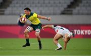 26 July 2021; Dylan Pietsch of Australia is tackled by Gwong Min Kim of Republic of Korea during the rugby sevens men's pool A match between Australia and Republic of Korea at the Tokyo Stadium during the 2020 Tokyo Summer Olympic Games in Tokyo, Japan. Photo by Stephen McCarthy/Sportsfile