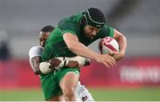 26 July 2021; Foster Horan of Ireland is tackled by Perry Baker of United States during the rugby sevens men's pool C match between Ireland and USA at the Tokyo Stadium during the 2020 Tokyo Summer Olympic Games in Tokyo, Japan. Photo by Stephen McCarthy/Sportsfile