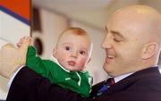 20 February 2004; Keith Wood who made a personal appearance on behalf of Tesco Personal Finance, with young Irish supporter Sean Hunter, aged 4 months, from Cork, at Tesco Merrion, Merrion Shopping Centre, Dublin. Picture credit; Brian Lawless / SPORTSFILE *EDI*