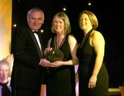 28 February 2004; Pat Moloney Lenihan, Cork, who was named on the Camogie team of the Century, with An Taoiseach, Bertie Ahern, T.D,  and Miriam O'Callaghan, Uachtaran, Cumann Camogaiochta na nGael, at the Cumann Camogaiocht na nGael centenary celebrations at the Citywest Hotel, Dublin. Picture credit; Brendan Moran / SPORTSFILE *EDI*