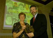 28 February 2004; Mairead McAtamney Magill with Sinn Fein President Gerry Adams, after she was named on the Camogie team of the Century, at the Cumann Camogaiocht na nGael centenary celebrations at the Citywest Hotel, Dublin. Picture credit; Brendan Moran / SPORTSFILE *EDI*