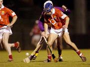 28 February 2004; Tom Kenny, Cork, in action against Paul Codd, Wexford. Allianz National Hurling League, Division 1B, Cork v Wexford, Pairc Ui Rinn, Cork. Picture credit; Damien Eagers / SPORTSFILE *EDI*