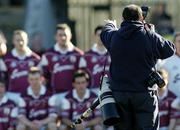 29 February 2004; A Local photographer, Mike Shaughnessy,  organises the Galway hurling team for a team photograph before the start of the game. Allianz National Hurling League, Division 1A, Galway v Kilkenny, Pearse Stadium, Galway. Picture credit; David Maher / SPORTSFILE *EDI*
