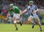 14 July 2013; Ronan Lynch, Limerick, in action against Tom Devine, Waterford. Electric Ireland Munster GAA Hurling Minor Championship Final, Waterford v Limerick, Gaelic Grounds, Limerick. Picture credit: Diarmuid Greene / SPORTSFILE