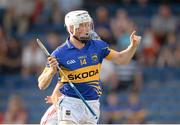 17 July 2013; Bill Walsh, Tipperary, celebrates after scoring his side's first goal. Bord Gáis Energy Munster GAA Hurling Under 21 Championship, Semi-Final, Cork v Tipperary, Semple Stadium, Thurles, Co. Tipperary. Picture credit: Stephen McCarthy / SPORTSFILE