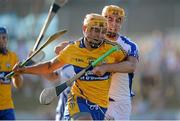 18 July 2013; Peter Duggan, Clare, in action against Paudie Prendergast, Waterford. Bord Gáis Energy Munster GAA Hurling Under 21 Championship Semi-Final, Clare v Waterford, Walsh Park, Waterford. Picture credit: Brian Lawless / SPORTSFILE